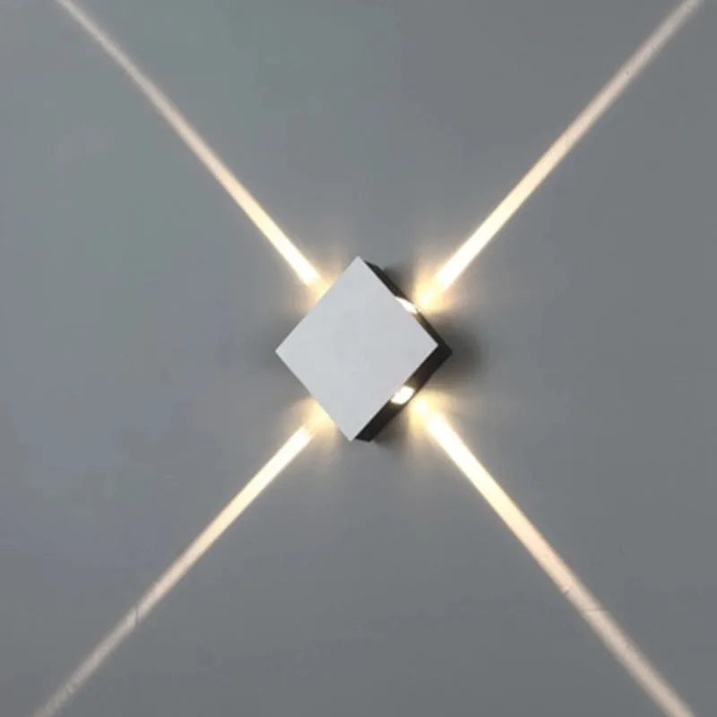 Modern square or round LED aluminium wall light with iron shade showing warm white illumination