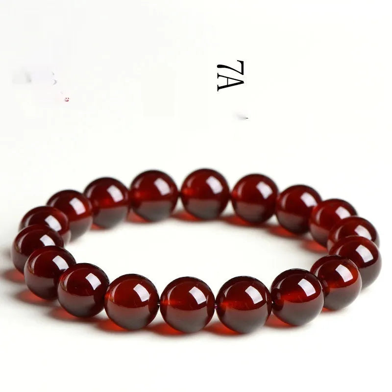 Natural orange red garnet ball bracelet with Ruyi style beads in 5A and 7A grades