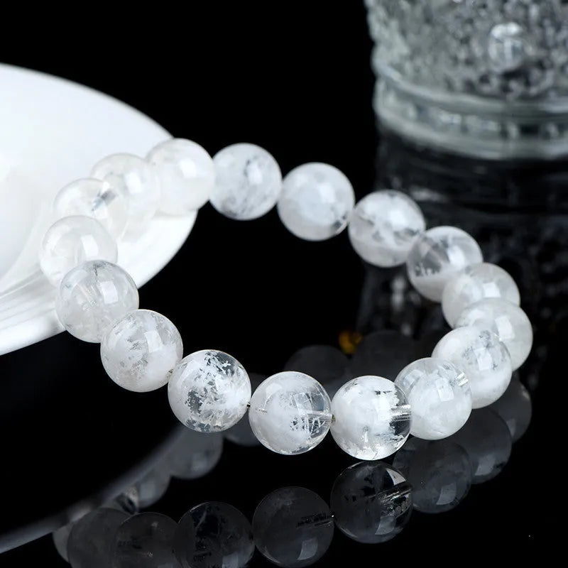 Natural crystal women's bracelet with blizzard snowflake round beads featuring Ruyi and Xiangyun design elements