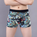 Men's floral print cotton boxer briefs on a white background, showing the U-shaped pouch design and mid-rise waistband.