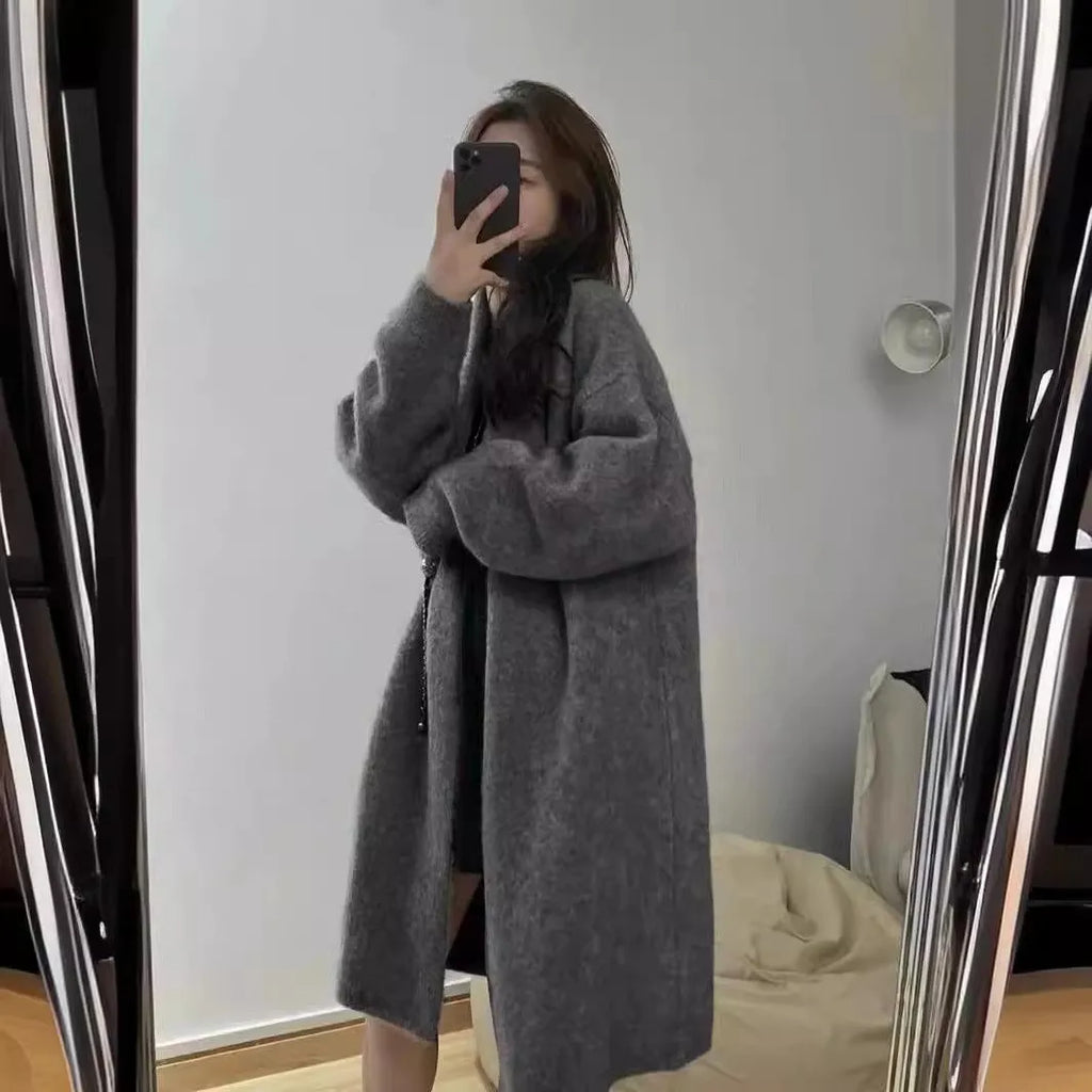 Women's mid-length knitted V-neck cardigan in loose fit available in five colours