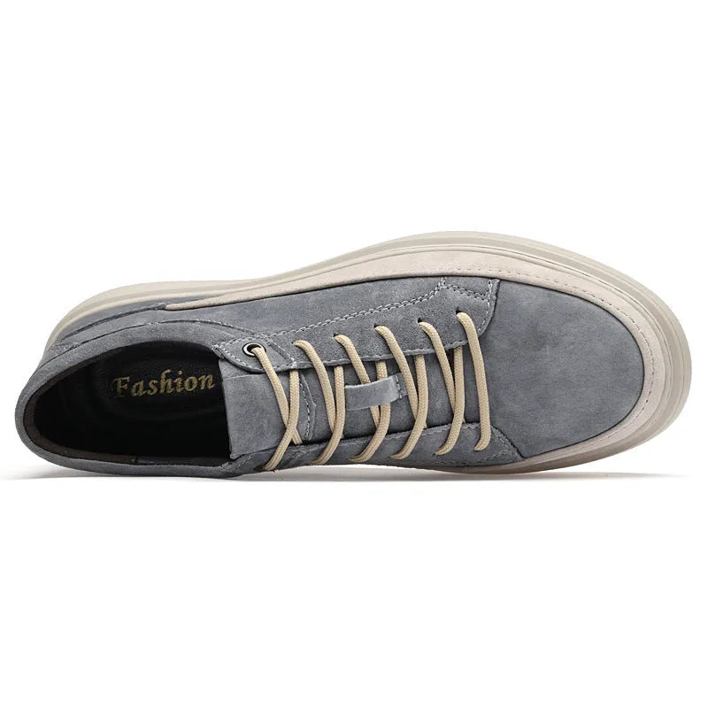 Men's grey casual leather skate shoes with round toe and lace-up front on a rubber sole.