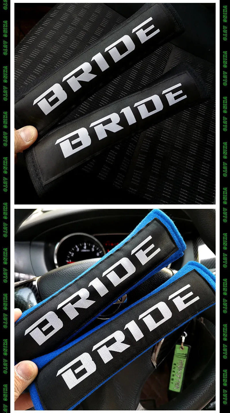 Pair of black car seat belt shoulder pad sleeves with embroidery detail, showing dimensions.