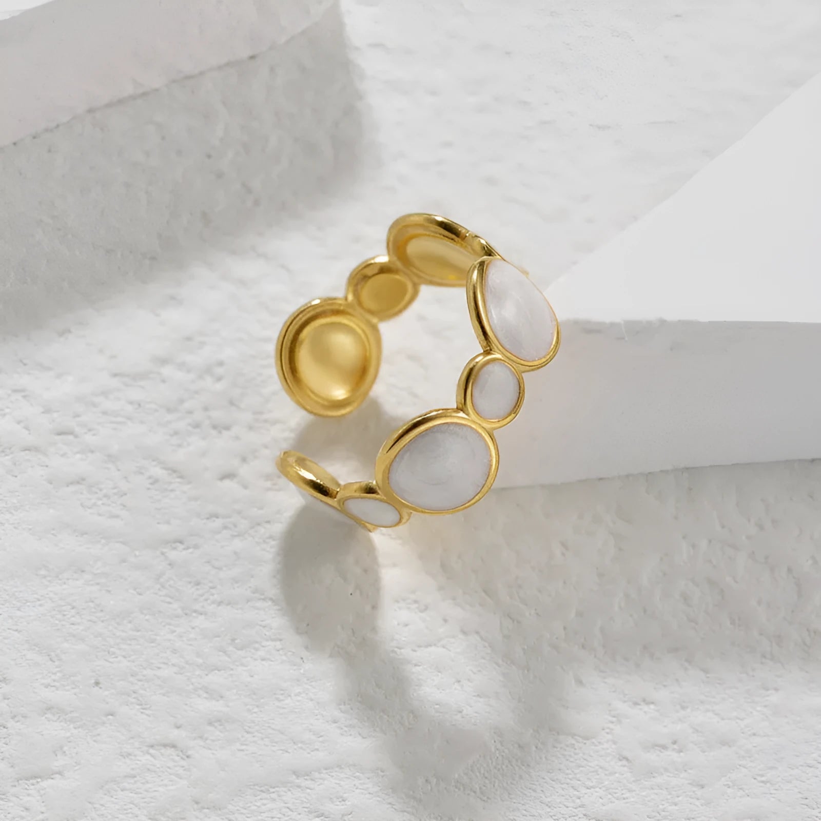 Geometric stainless steel adjustable ring with electroplated metallic finish