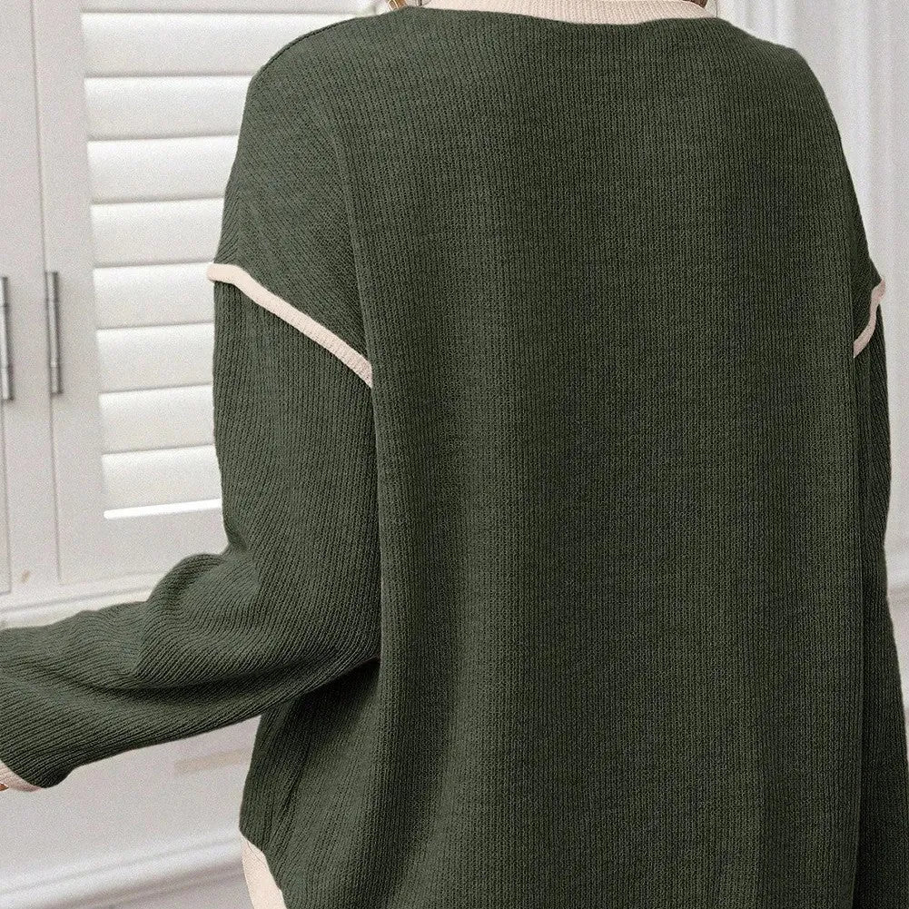 Drop shoulder loose knit top with four leaf clover contrast colour trim in polyester-elastane fabric