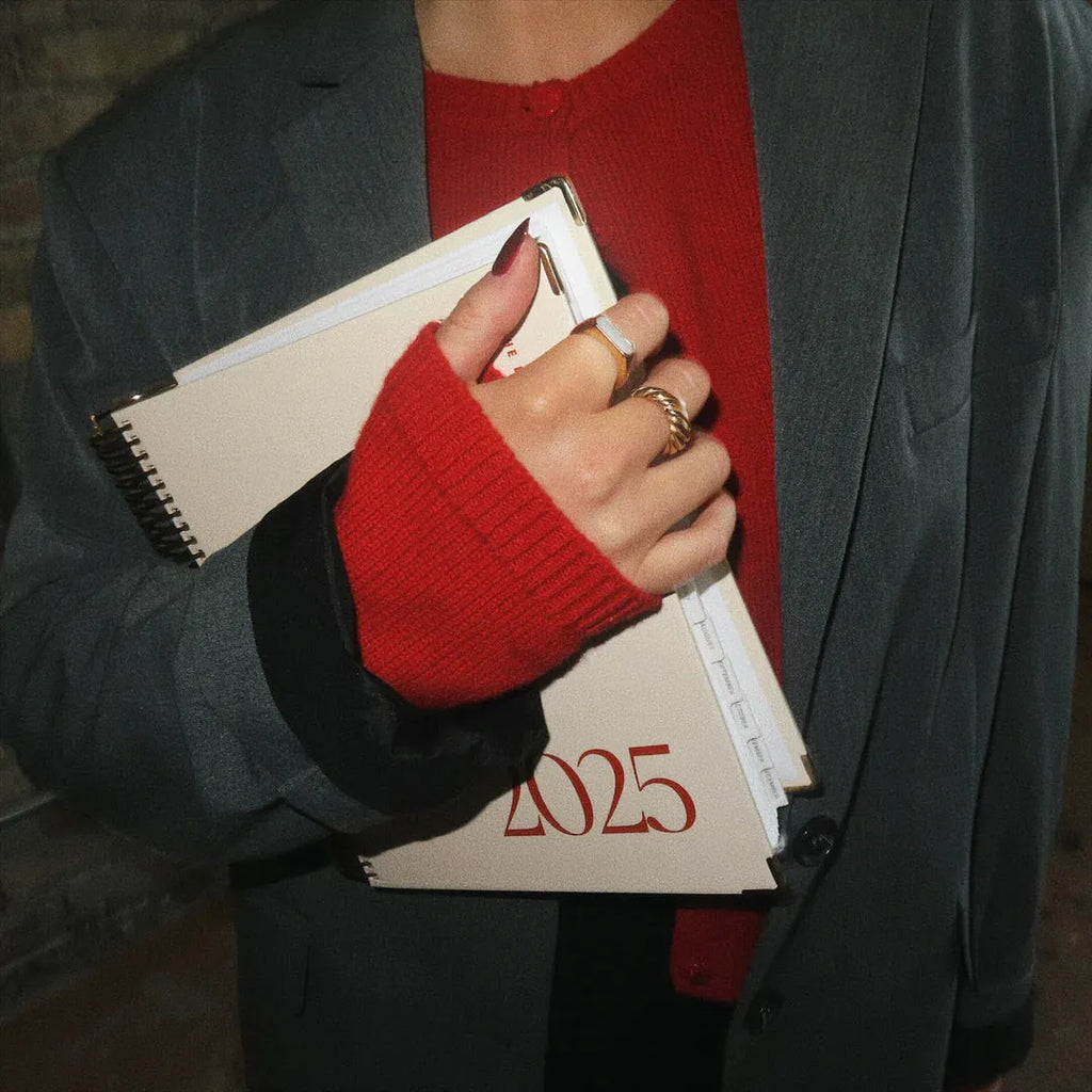 Cherry red spiral-bound coil notebook with A5 paper pages for daily planning