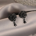 Black rose zircon flower stud earrings with electroplated 18K gold finish on copper