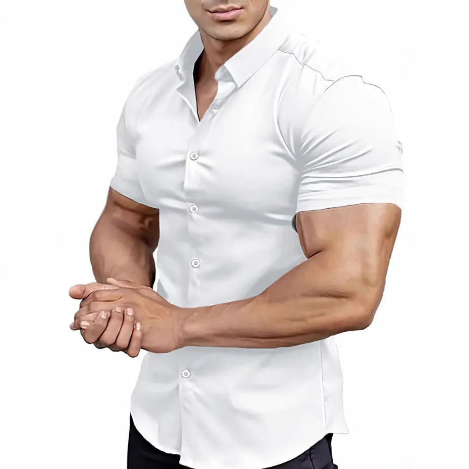 Man wearing a brown short sleeve printed casual shirt with a shirt collar.