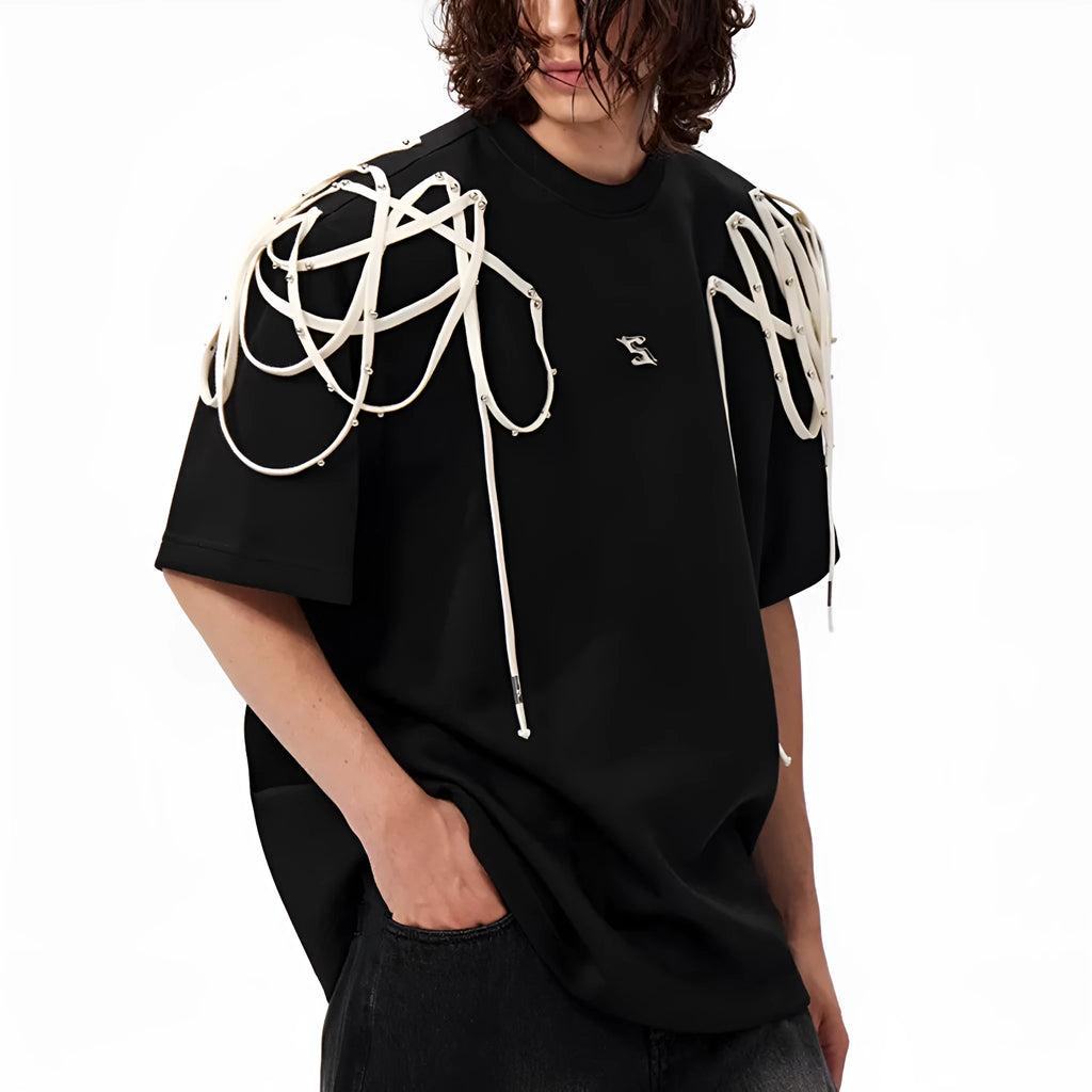 Black loose fit t-shirt with padded shoulders featuring rivet ribbon detail