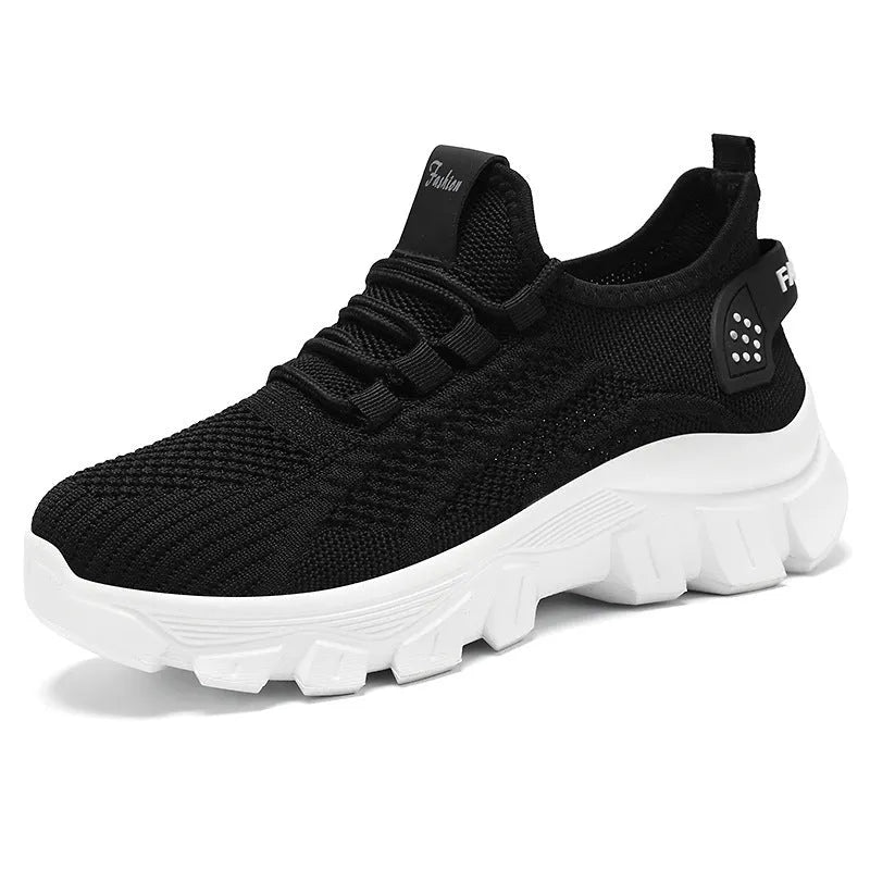 Women's white sneaker with thick PVC sole and breathable flyknit upper