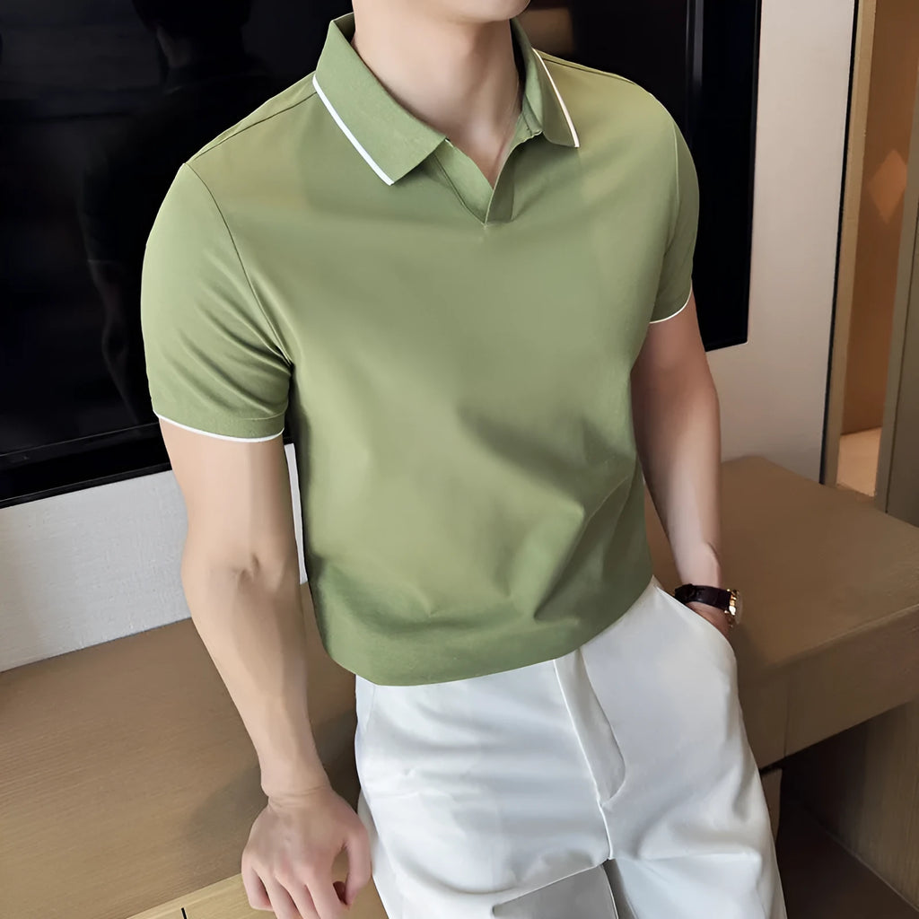 Men's short sleeve polo shirt in a mercerised cotton blend with a lapel collar, shown in graphite grey.