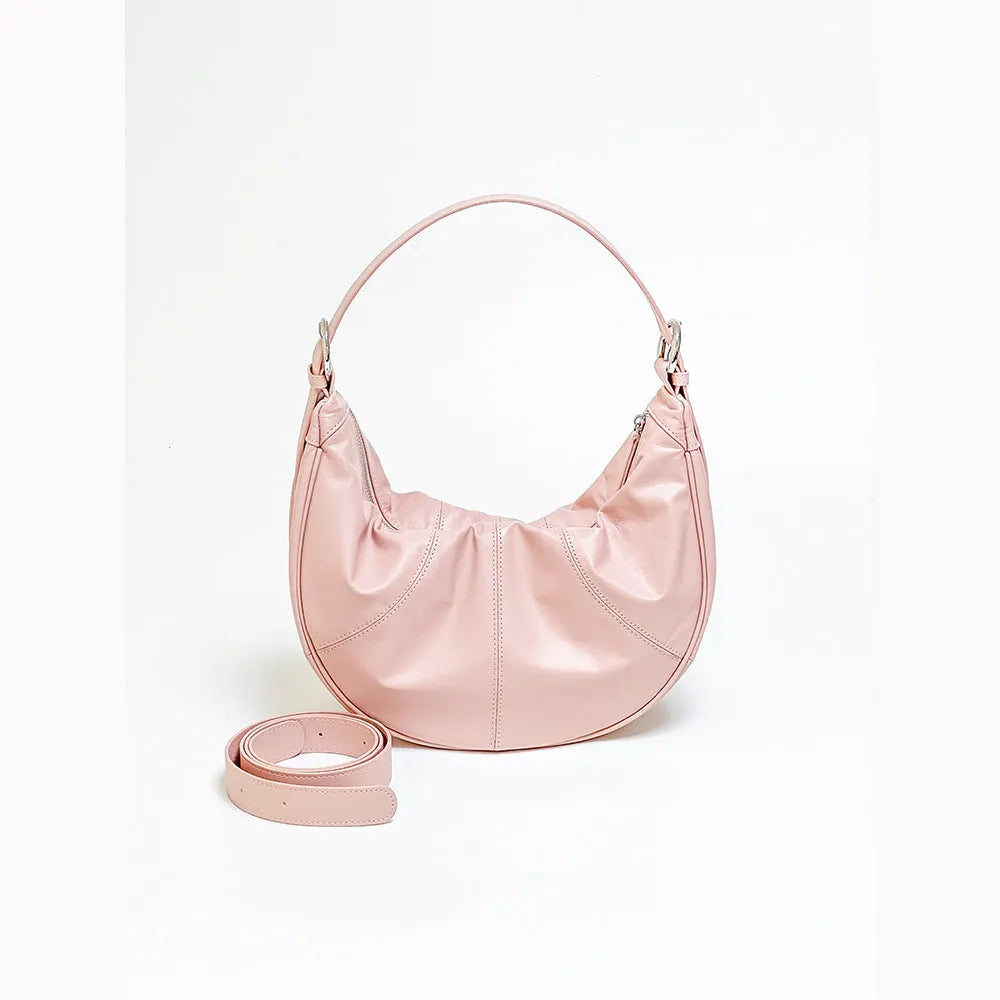 First layer cowhide shoulder bag in dumpling shape with double joint strap and sandwich pocket available in multiple colours