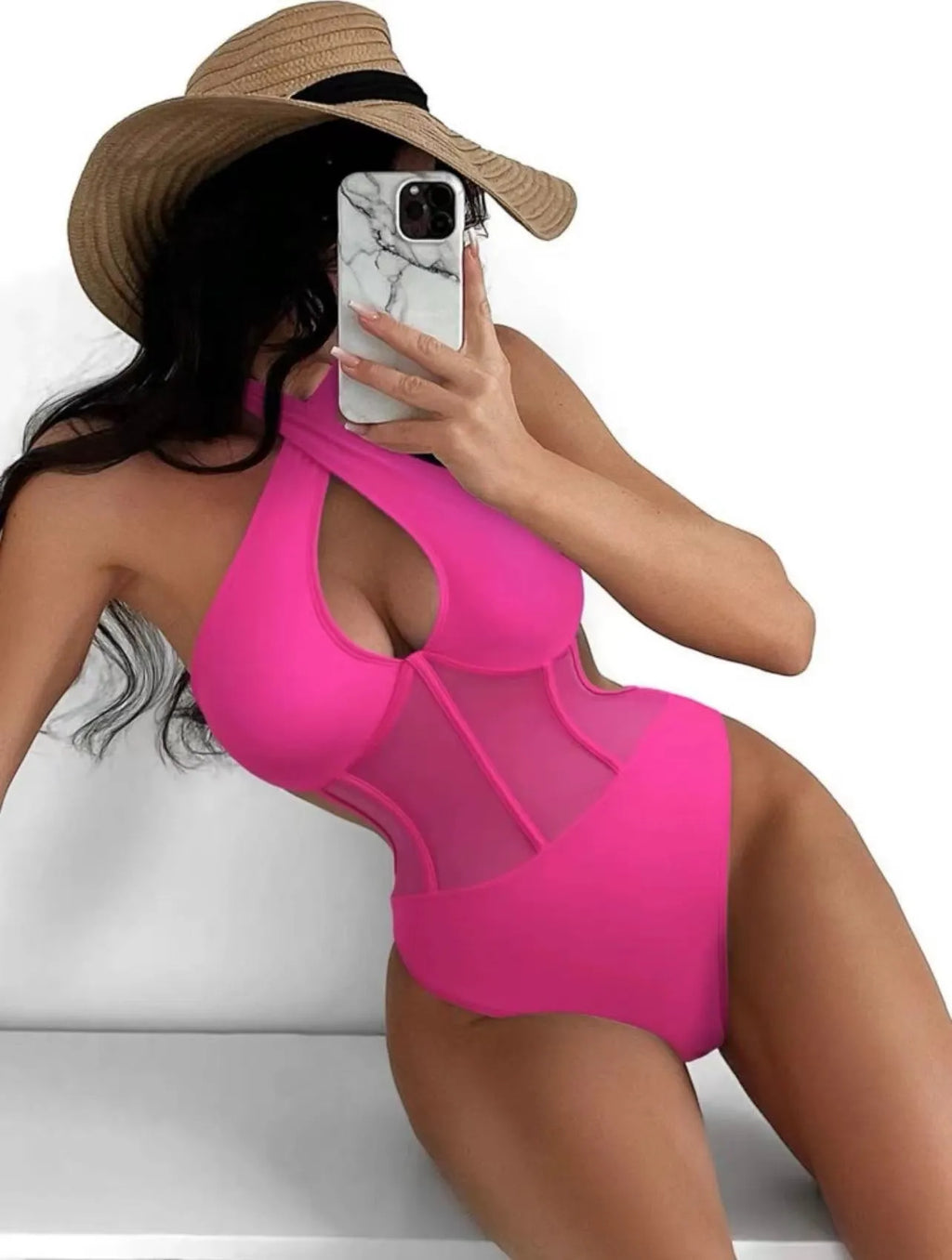 Women's black one-piece racerback swimsuit made from nylon and spandex blend fabric.