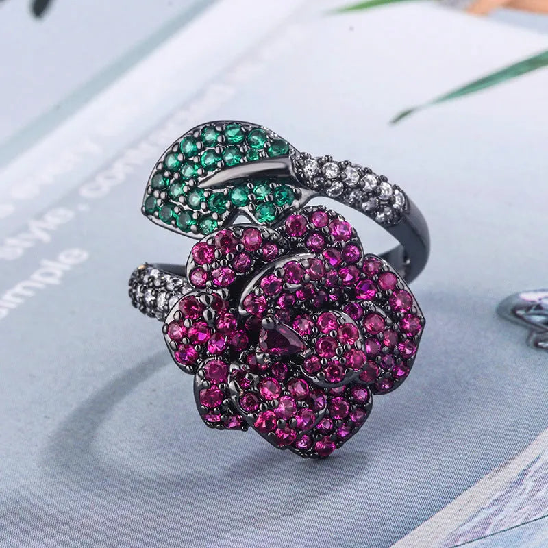 Black gold geometric ring with red corundum simulation stone on copper base with gold plating