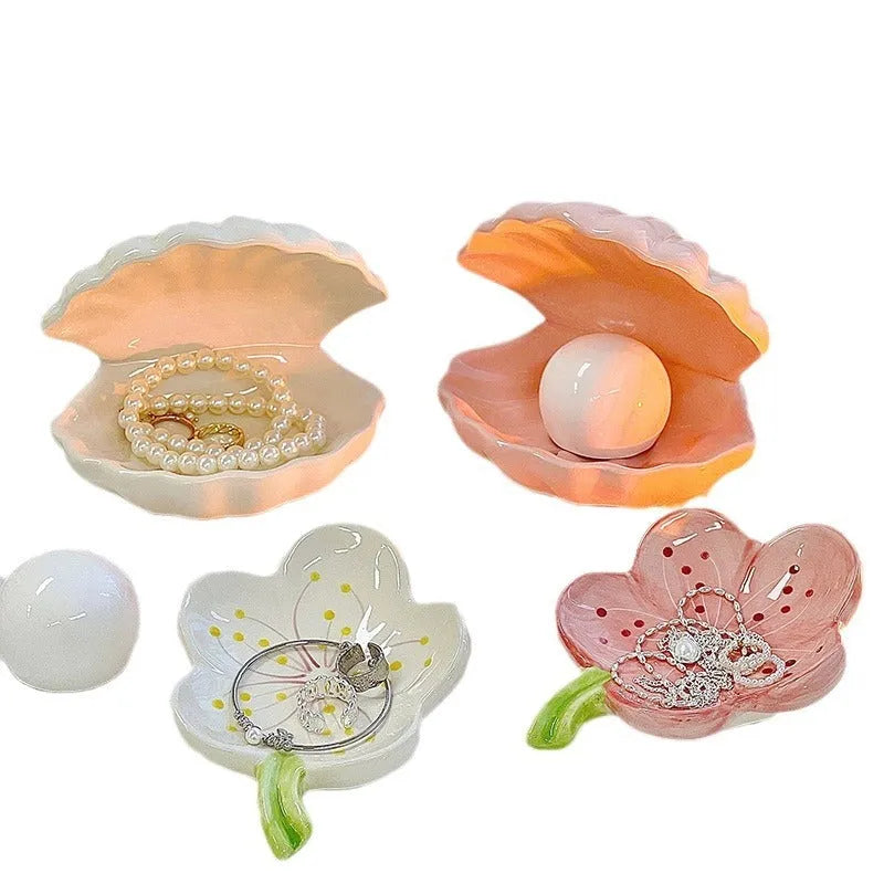 White porcelain storage tray with integrated small night light in modern minimalist style.