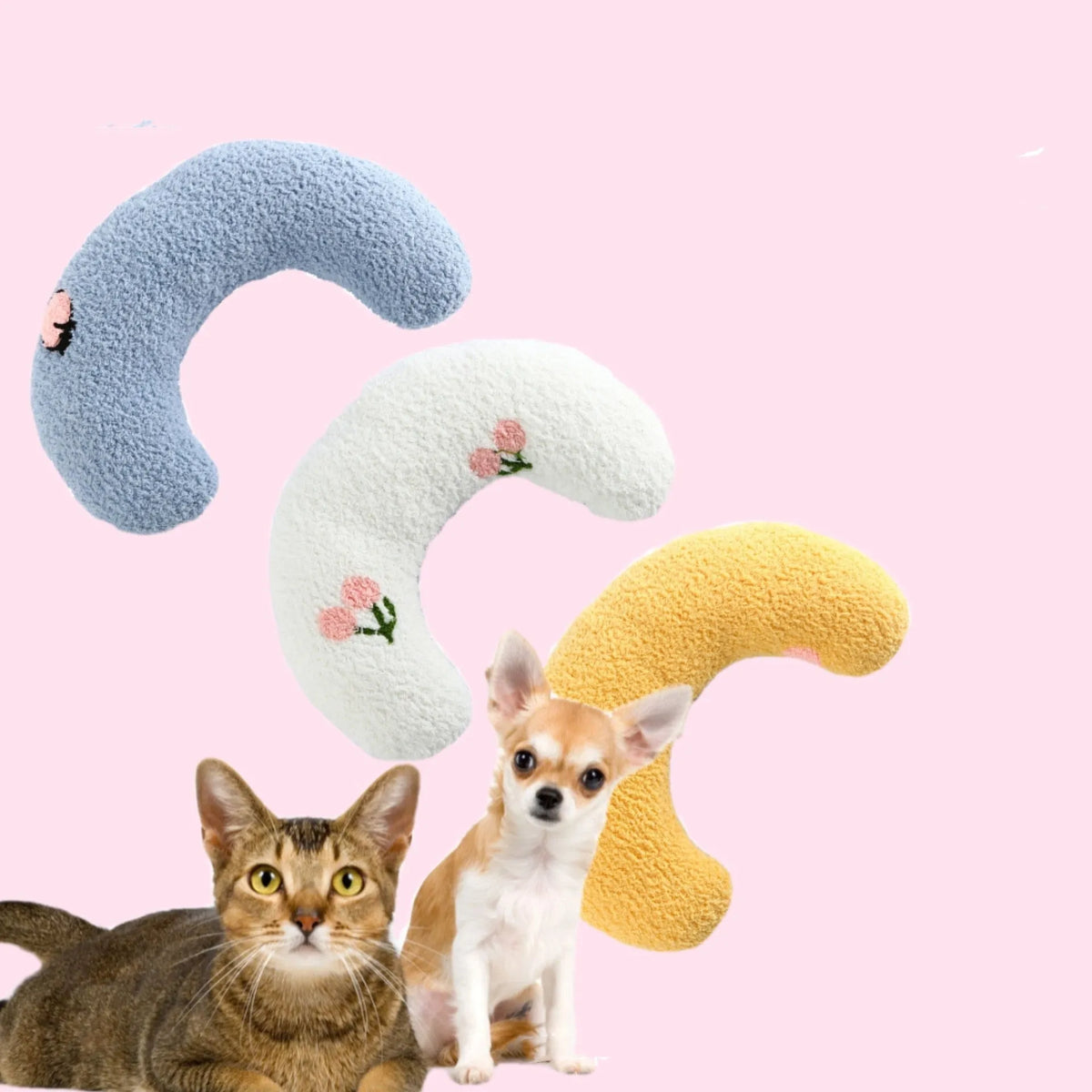 Small blue half-donut shaped pet pillow bed for cats or small dogs on a carpet.