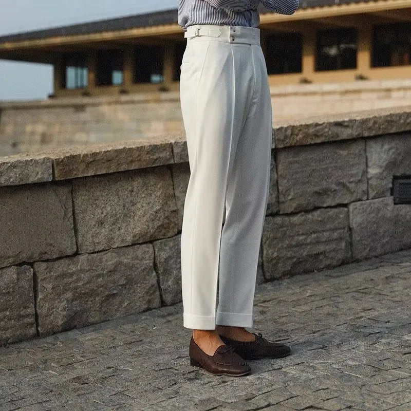 Slim fit straight cut men's suit trousers in apricot, black, or white.