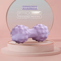 Blue TPR foot massage ball with textured surface shown next to foot for scale