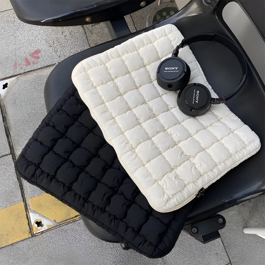 Large black nylon laptop bag open showing interior compartments for 15.6 inch computer