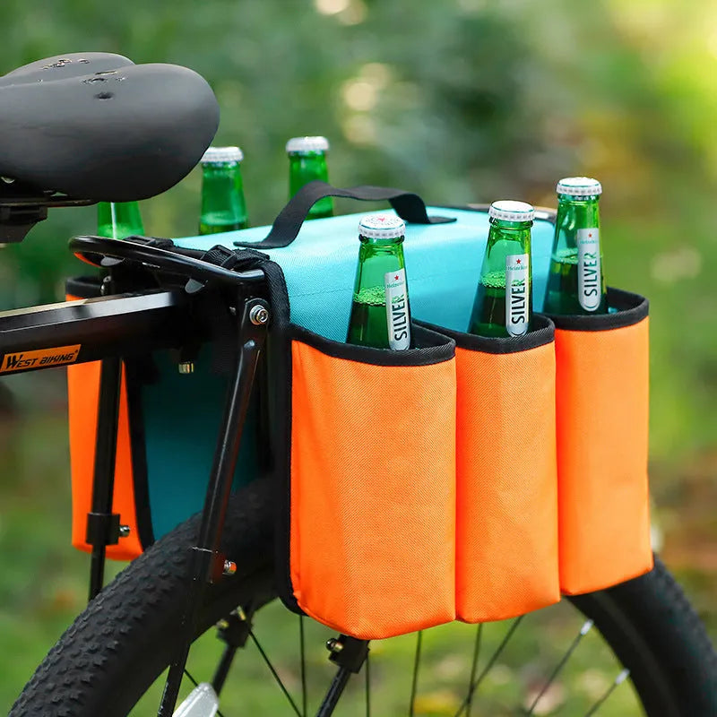 Black and orange double-sided bicycle drink bag made from 600D PVC mounted on handlebars.