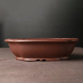 Handmade purple clay Chinese style bonsai basin measuring 25cm by 20cm by 7cm
