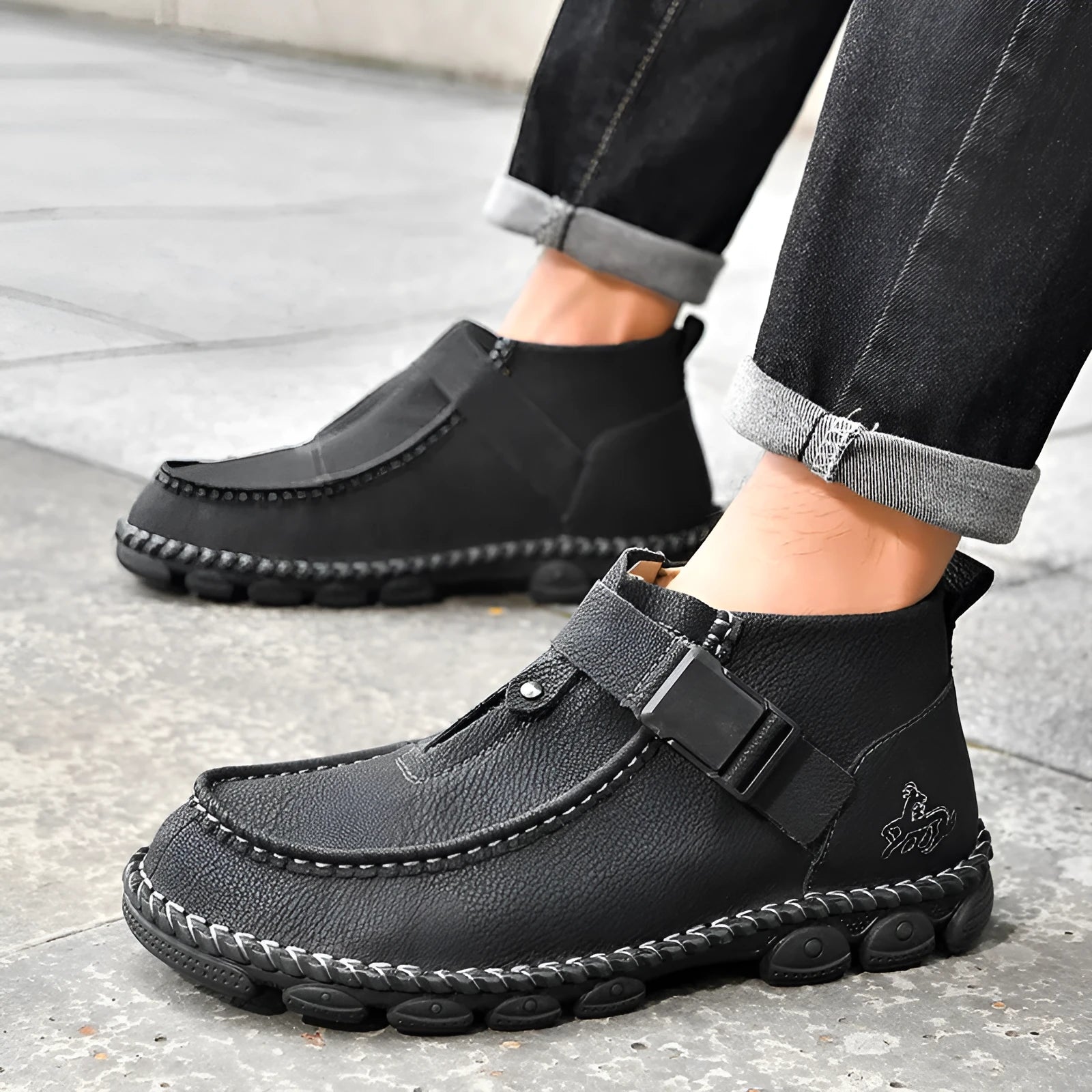 Men's black PU leather slip-on shoes with a flat sole and hand-stitched construction.