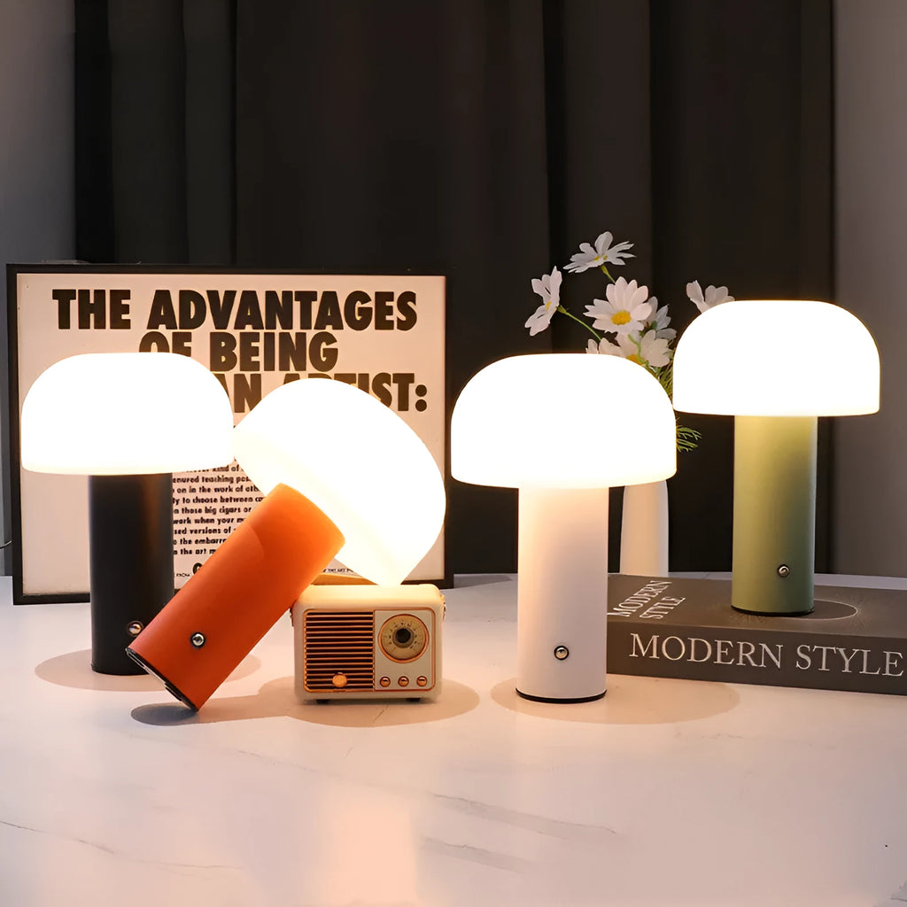 USB-powered plastic table lamp with integrated charging port in black, green, orange, or white.