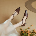 Brown and black ladies' high heels with pointed toe and cowhide leather upper in vintage European style