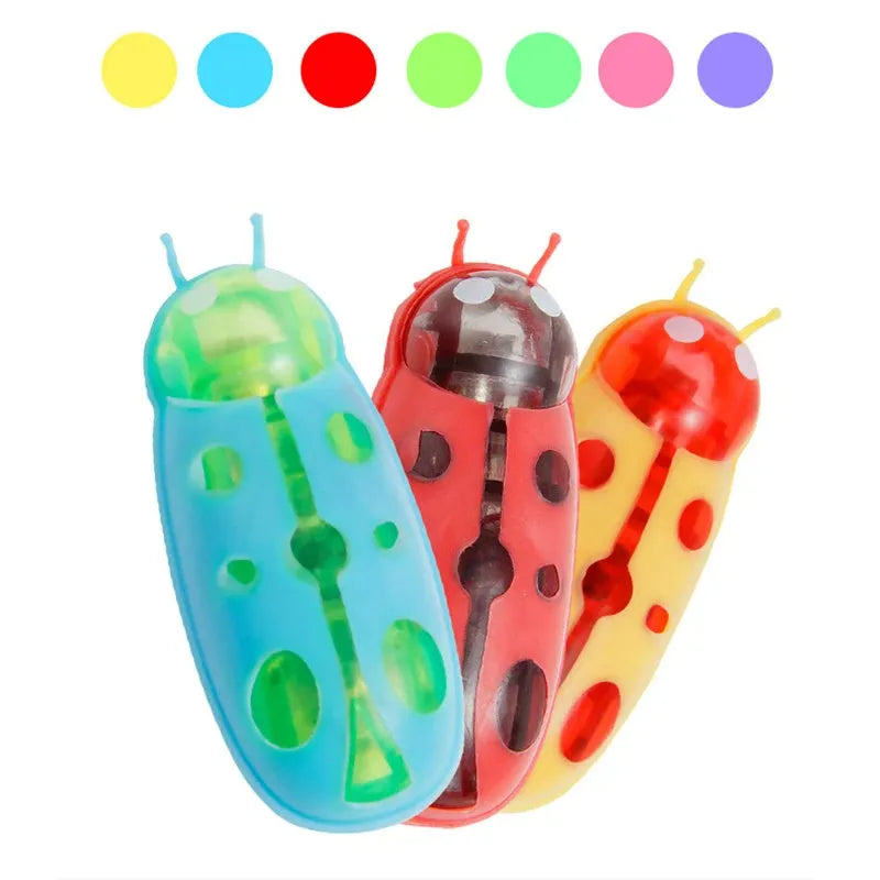Mini electric bug cat toy showing ladybird beetle shape with walking legs and compact 4.5cm size