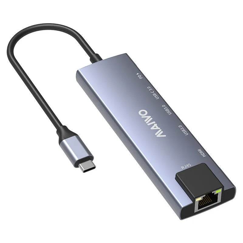 Aluminium Steam Deck docking station with HDMI, Ethernet, and USB ports on a desk