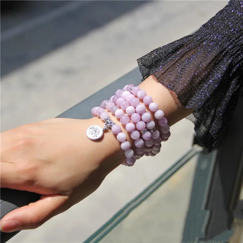 A women's vintage bracelet made of natural stone featuring a lotus geometry design.