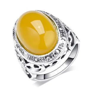 Geometric fluorescent beeswax design alloy ring in antique silver amber finish.