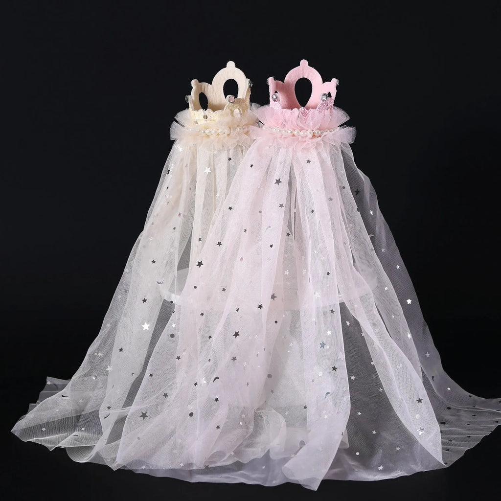 Beige and pink Princess crown veil headdress for a cat on a mannequin head.