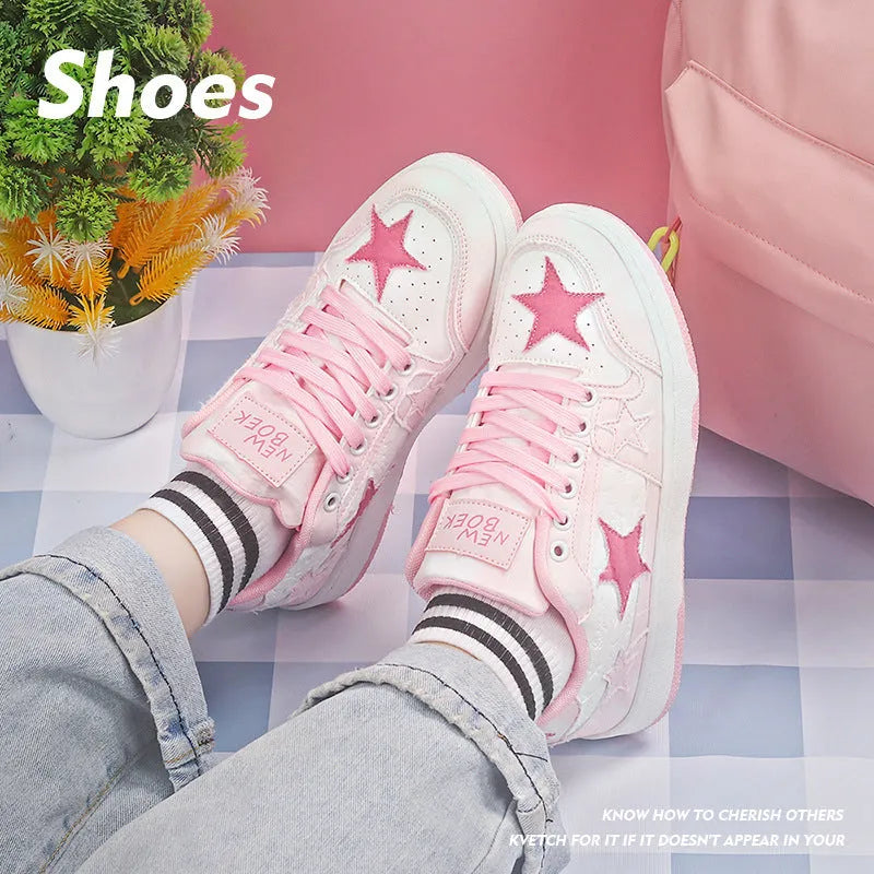A pair of denim skateboard shoes with a flat rubber sole and lace-up front, shown in a solid colour.