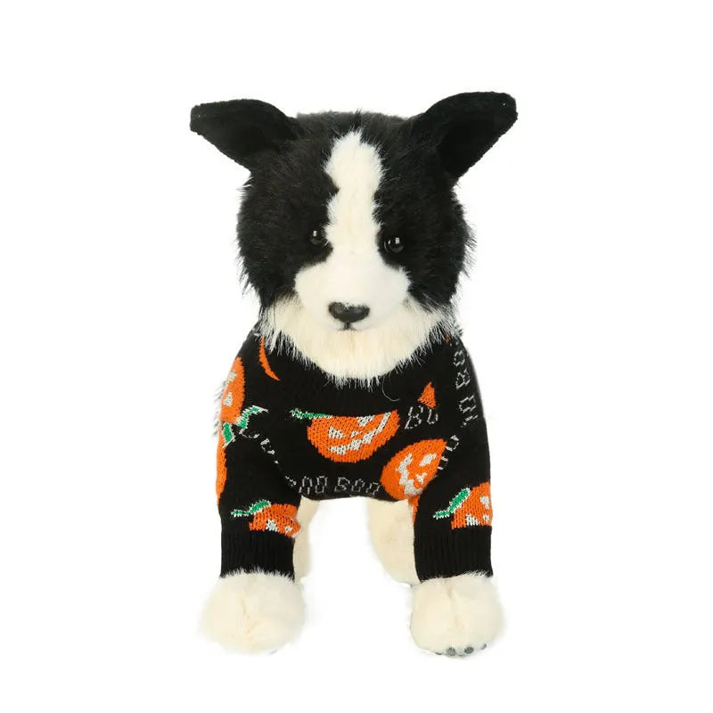 Black Halloween dog sweater with orange pumpkin pattern shown on model dog