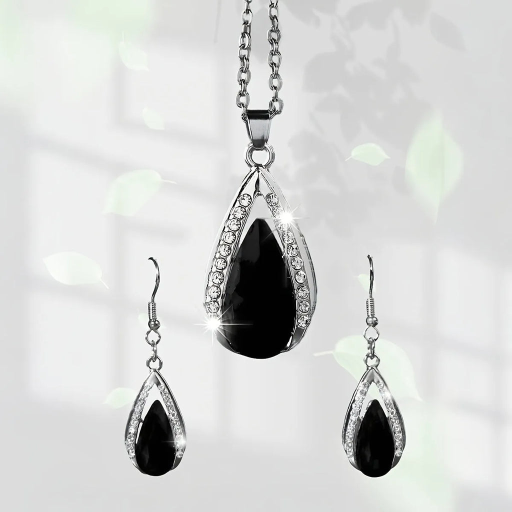 Black and red teardrop glass pendant necklace and matching earrings set with water droplet design