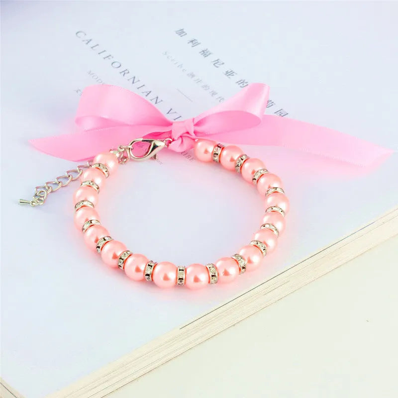 Handmade imitation pearl and rhinestone dog necklace with ribbon bow and adjustable clasp in blue pink purple or white for small pets