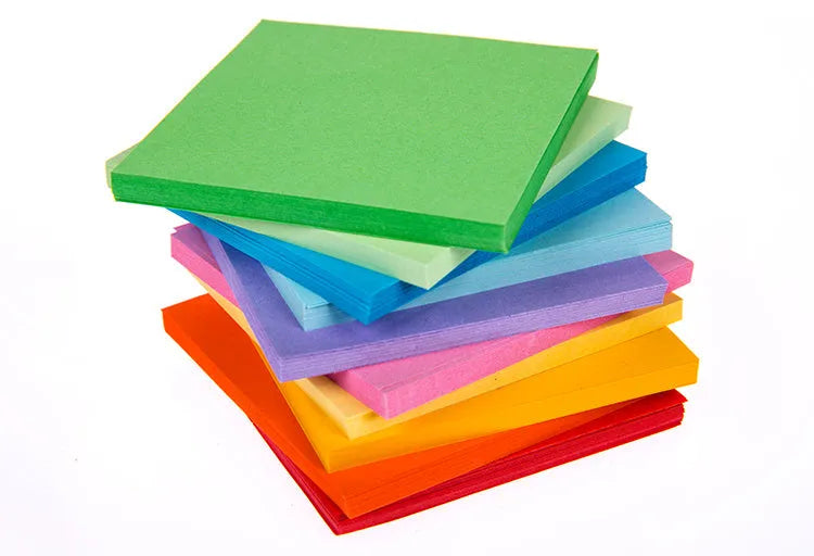 Colourful drift bottle message paper scrolls in various sizes with metal eyelets for hanging.