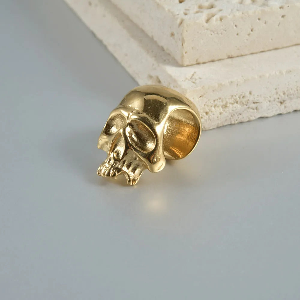 Stainless steel hollow skull Buddha earring in gold, black or steel colour for unisex hip hop fashion