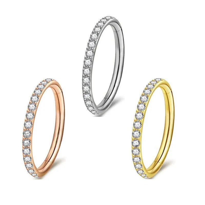 Stainless steel seamless round nose ring showing electroplated colour variations and size specifications