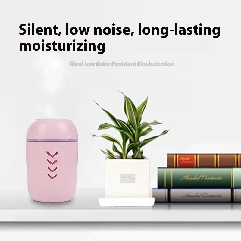 Compact round portable air purifier in blue colour with USB cable for car or desk use.