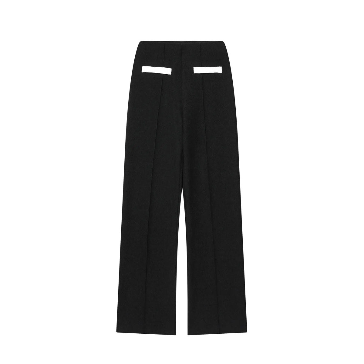 Women's beaded top and high-waisted trouser co-ord suit in contrasting colours, street fashion style.