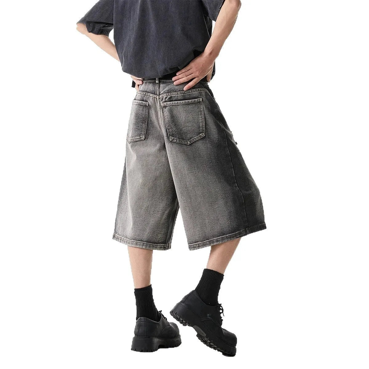 Grey washed denim shorts with distressed holes, loose-fit cropped design for summer casual wear