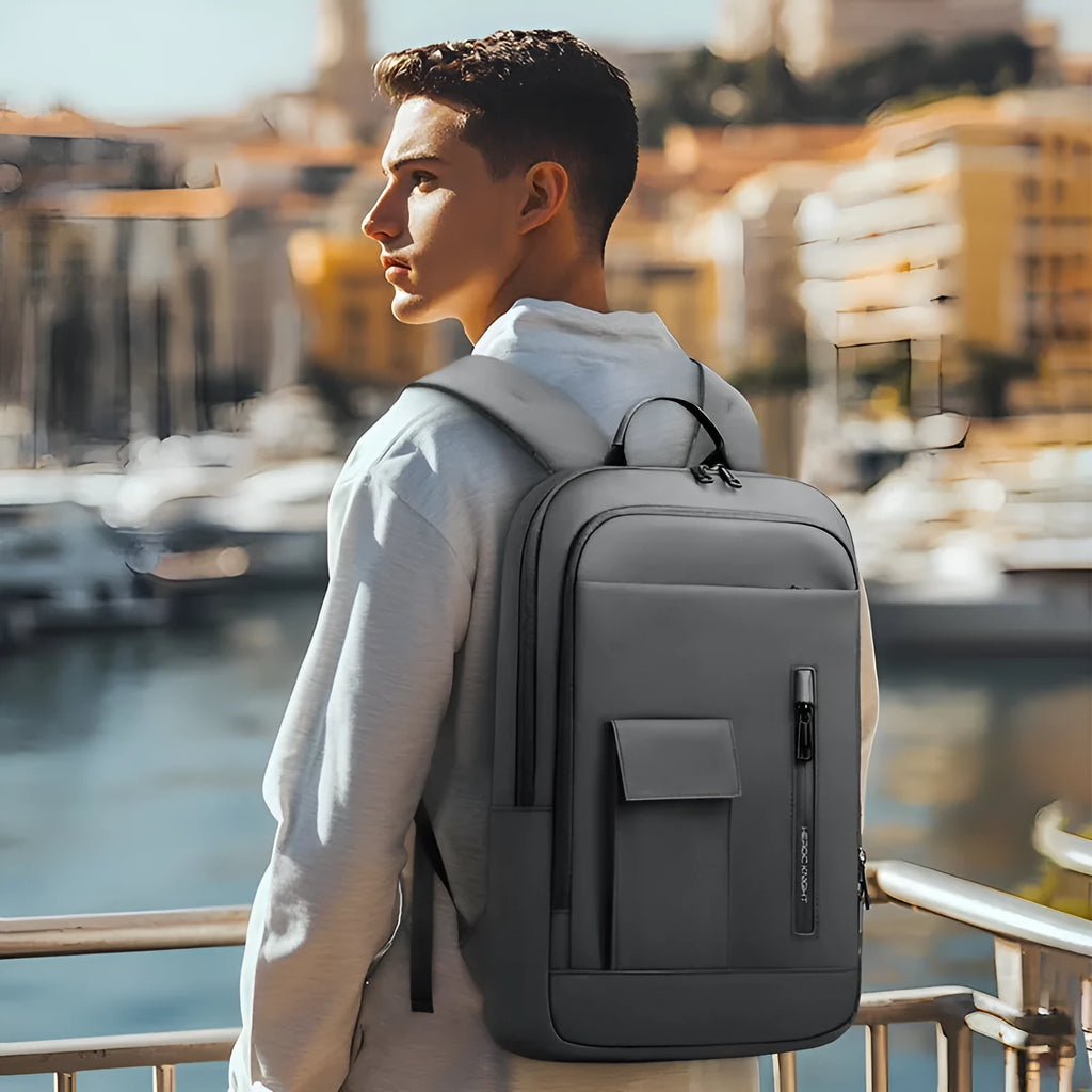 Men's lightweight Oxford cloth backpack in dark grey, shown from the front.