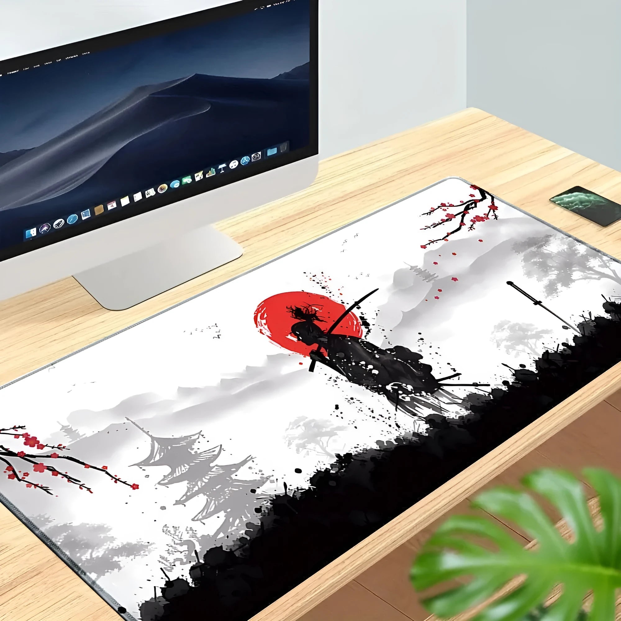 Japanese samurai design cloth gaming mouse pad on a desk, showing non-slip base and custom artwork.