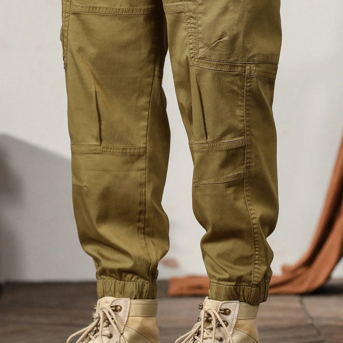 Men's American retro style tapered harem pants with ankle banded leg opening in cotton fabric