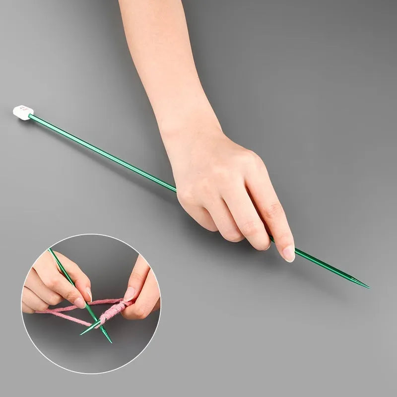 Lengthened crochet hook set showing multiple sizes with protective caps on ergonomic handles