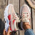Women's flyknit mesh sneakers with rubber sole and lace-up design in black and gray