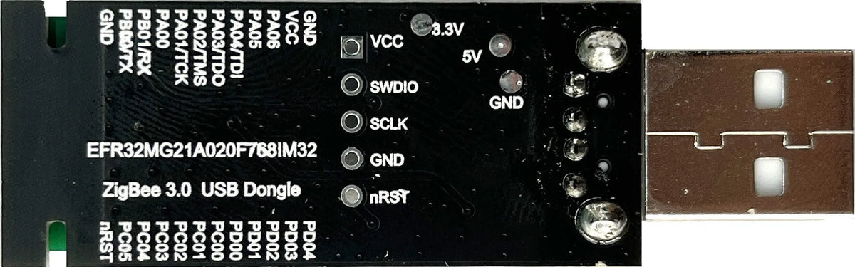 Silicon Labs EFR32MG21 Zigbee USB dongle with plastic shell and USB connector.