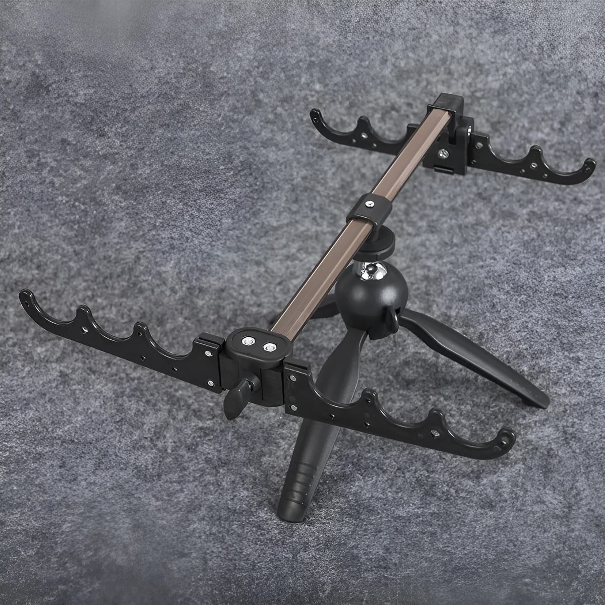 Aluminium ice fishing rod holder bracket with tripod legs supporting a small fishing rod